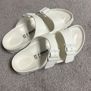 White Birkenstock Arizona sandals